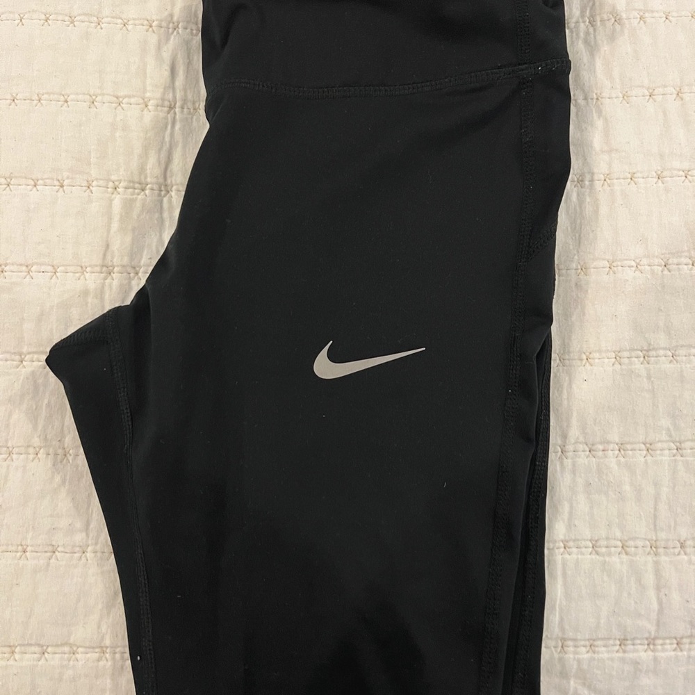 Women’s black Nike running pants